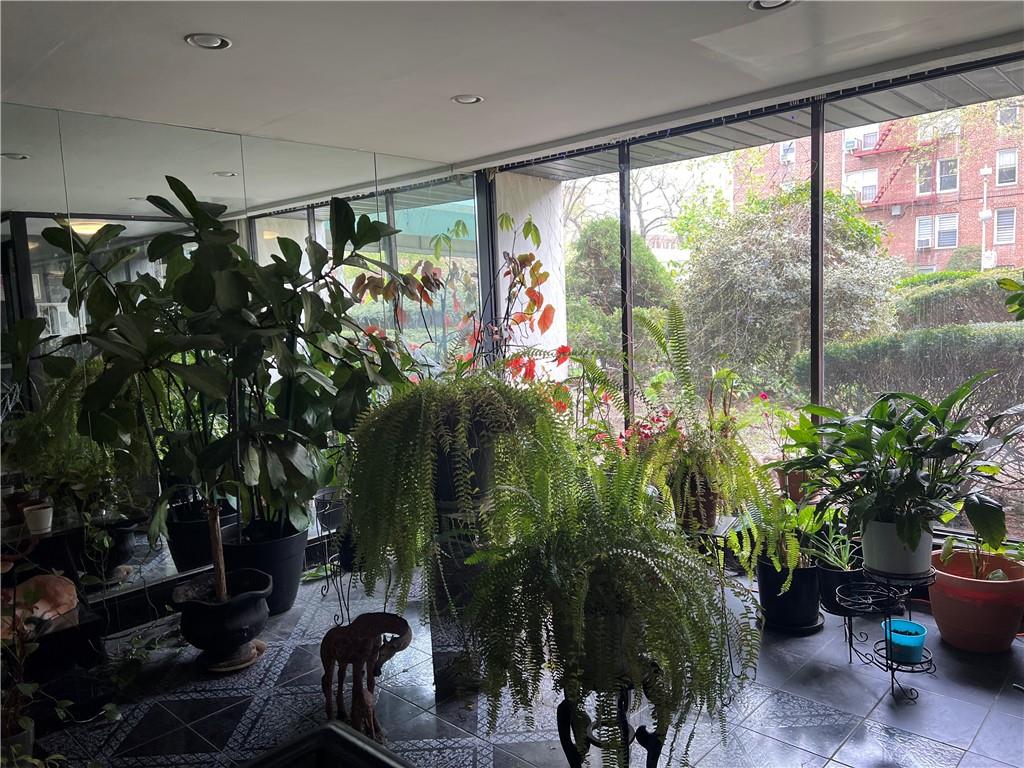 2678 Ocean Avenue, Unit L4 Brooklyn, NY 11229 - Photo 8 of 11 a room with garden view and a potted plant