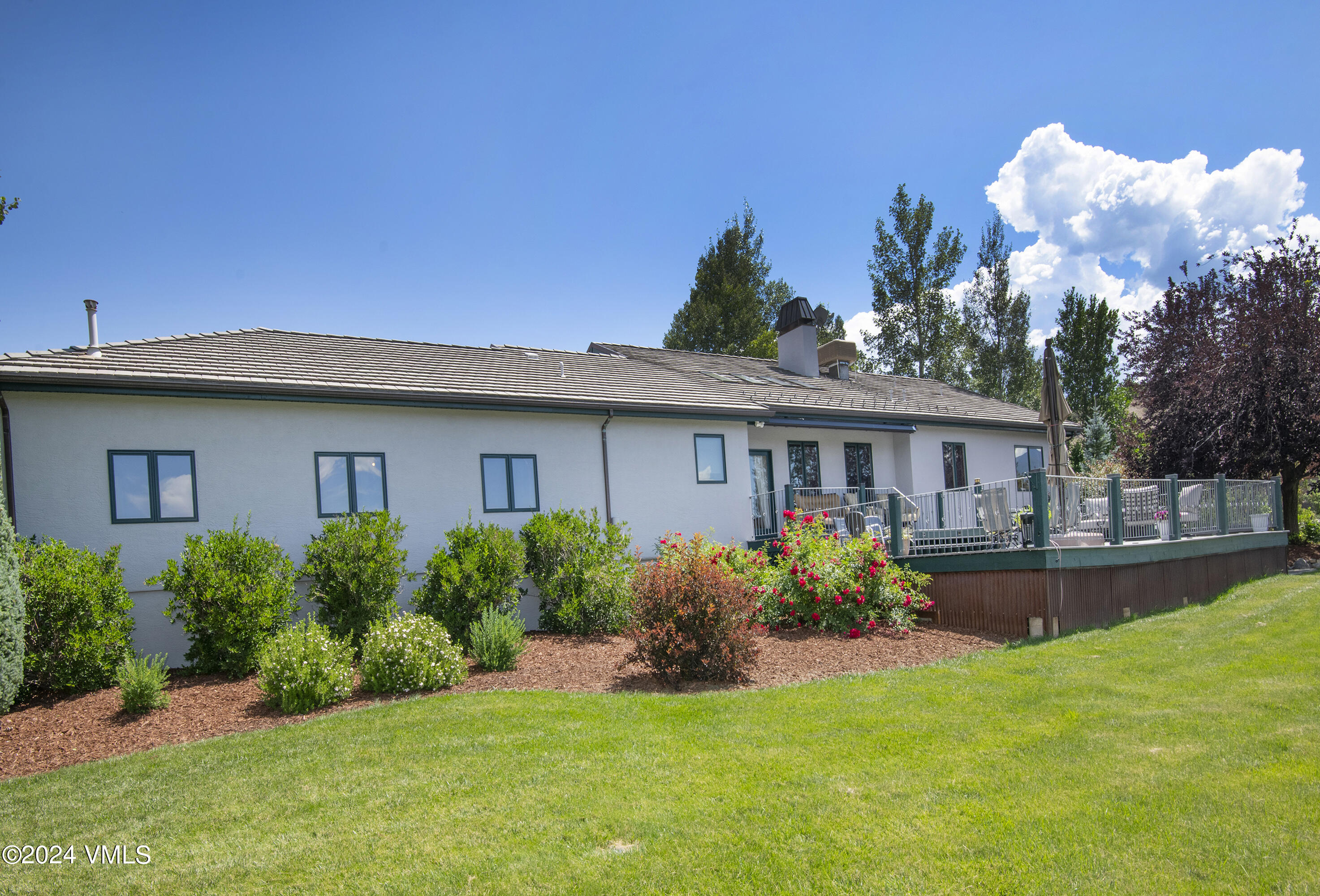 911 Mayne Street Gypsum, CO 81637 - Photo 65 of 87 a front view of house with yard and green space