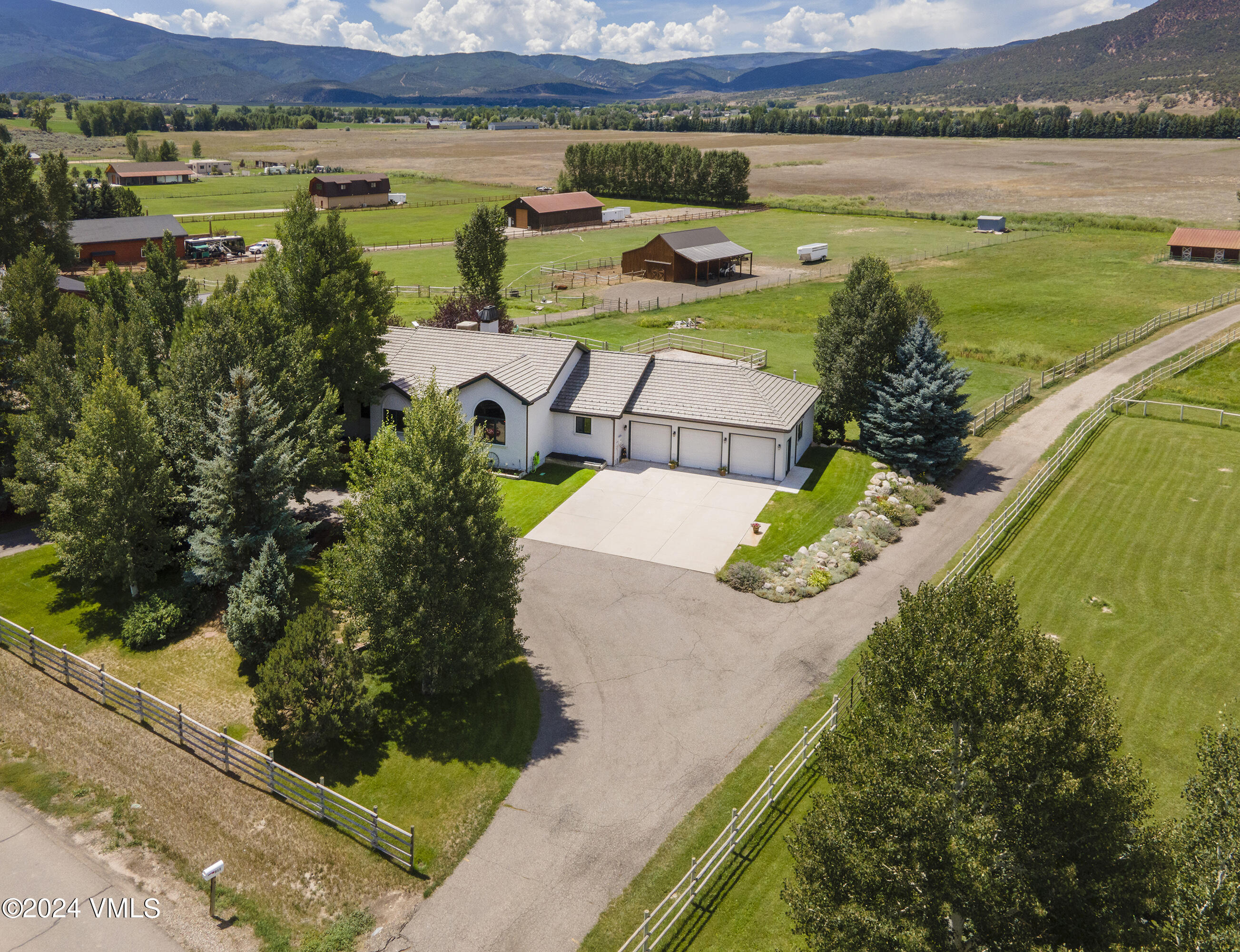 911 Mayne Street Gypsum, CO 81637 - Photo 73 of 87 an aerial view of a house with a yard basket ball court and outdoor seating