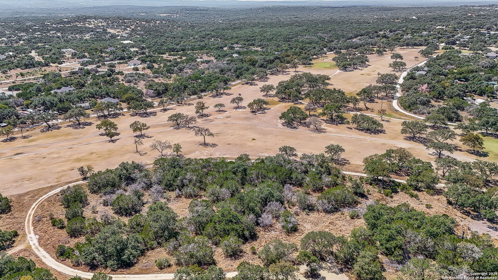 203 Contour Drive Spring Branch, TX 78070 - Photo 4 of 6 an aerial view of house with yard