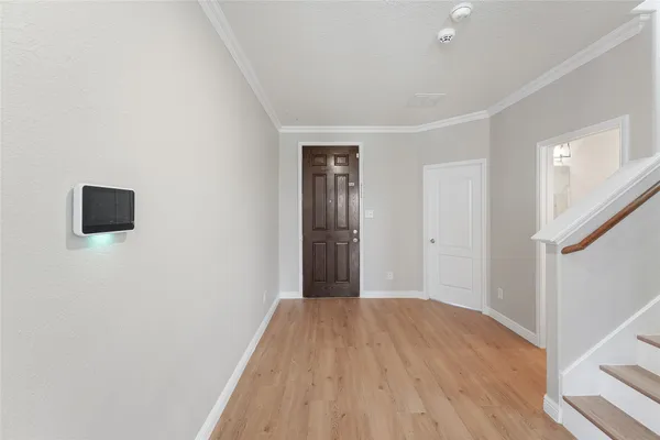 a view of a livingroom with wooden floor