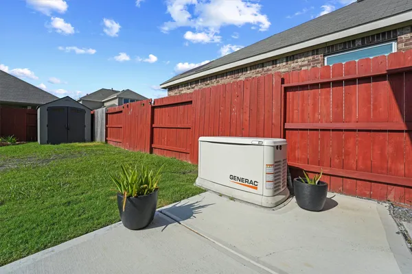a view of a back yard of the house