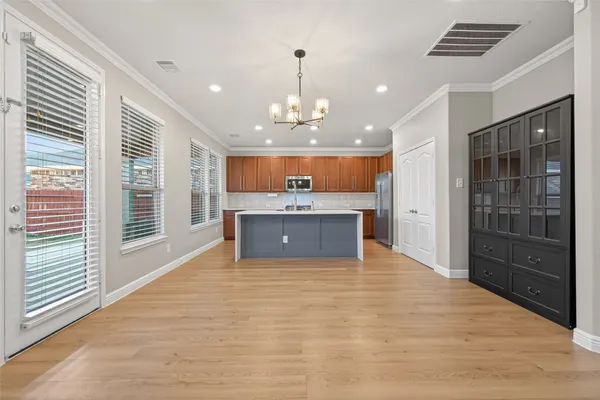 a view of a kitchen with a sink and a kitchen