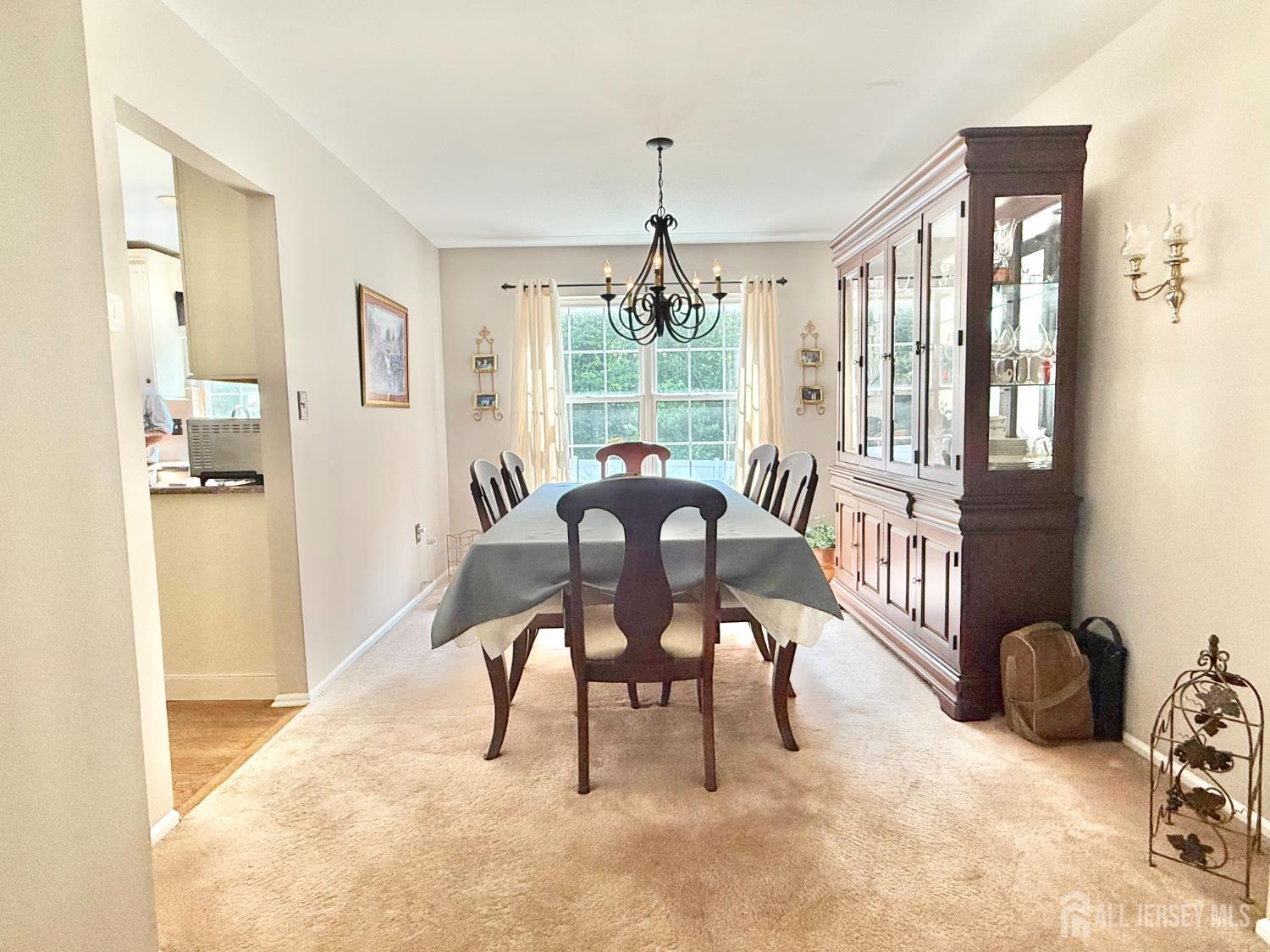 44 Diamond Lane Howell, NJ 07731 - Photo 11 of 35 a view of a livingroom with furniture and a window