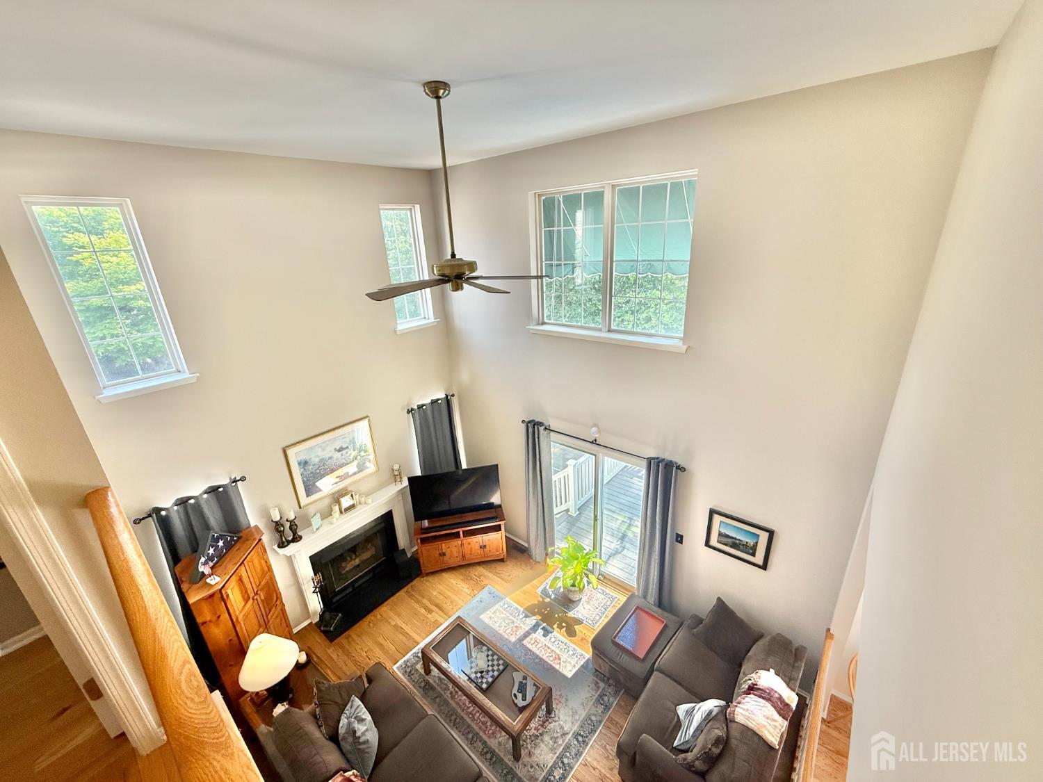 44 Diamond Lane Howell, NJ 07731 - Photo 16 of 35 a living room with furniture and a window