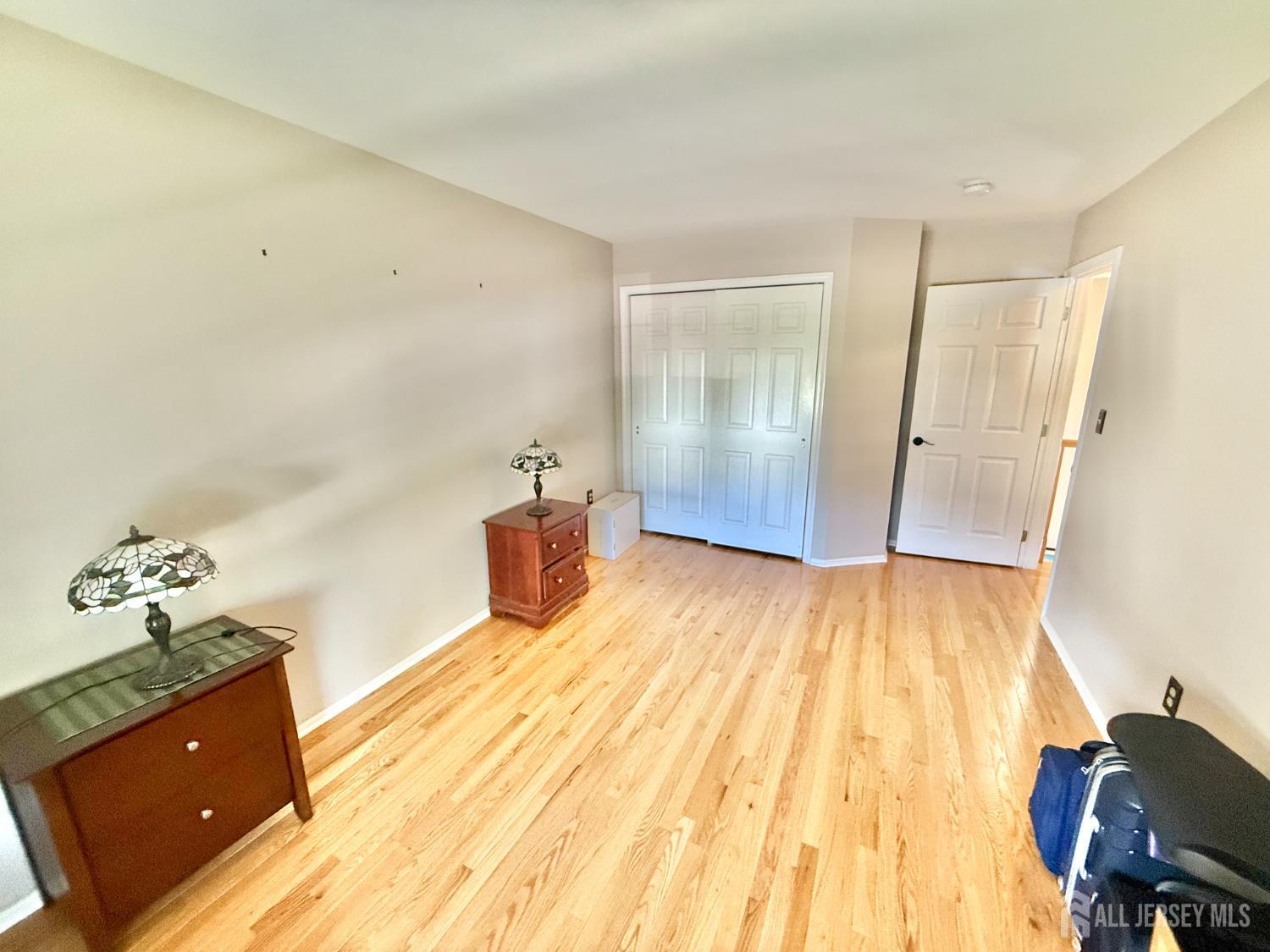 44 Diamond Lane Howell, NJ 07731 - Photo 21 of 35 a view of a room with wooden floor and bathroom