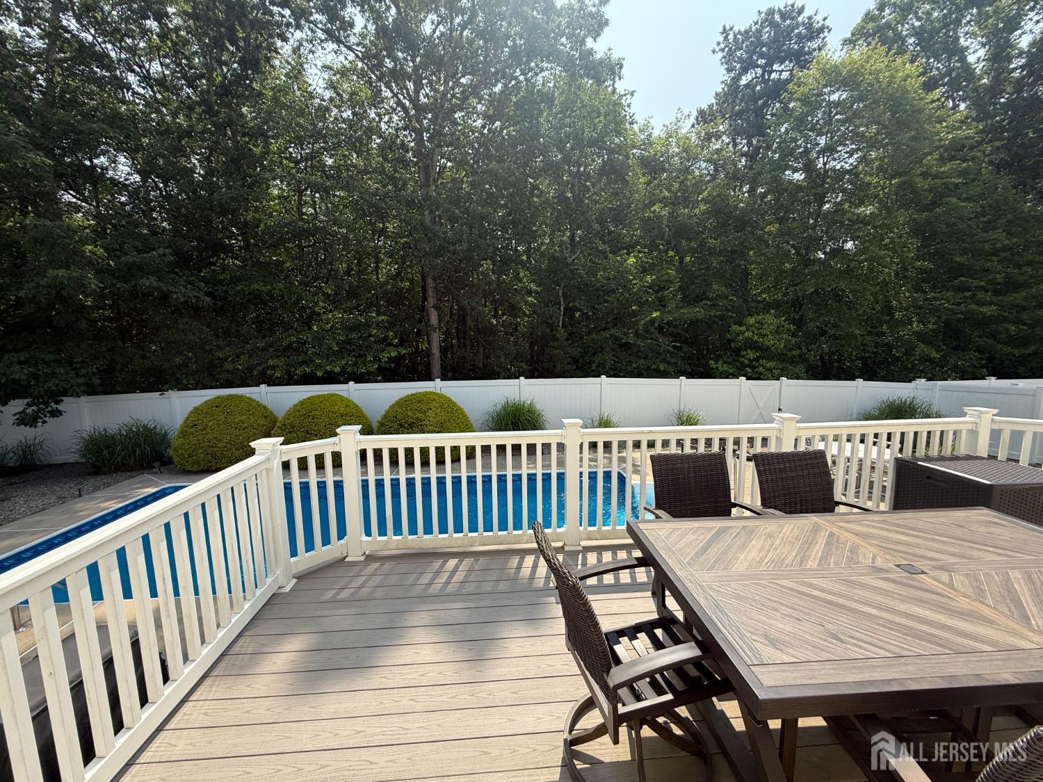 44 Diamond Lane Howell, NJ 07731 - Photo 32 of 35 a view of balcony with wooden floor and outdoor seating