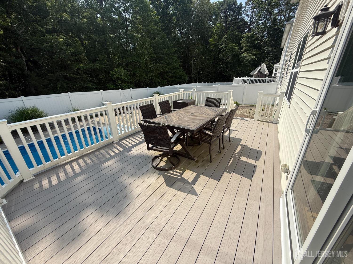44 Diamond Lane Howell, NJ 07731 - Photo 34 of 35 a roof deck with chairs and wooden floor