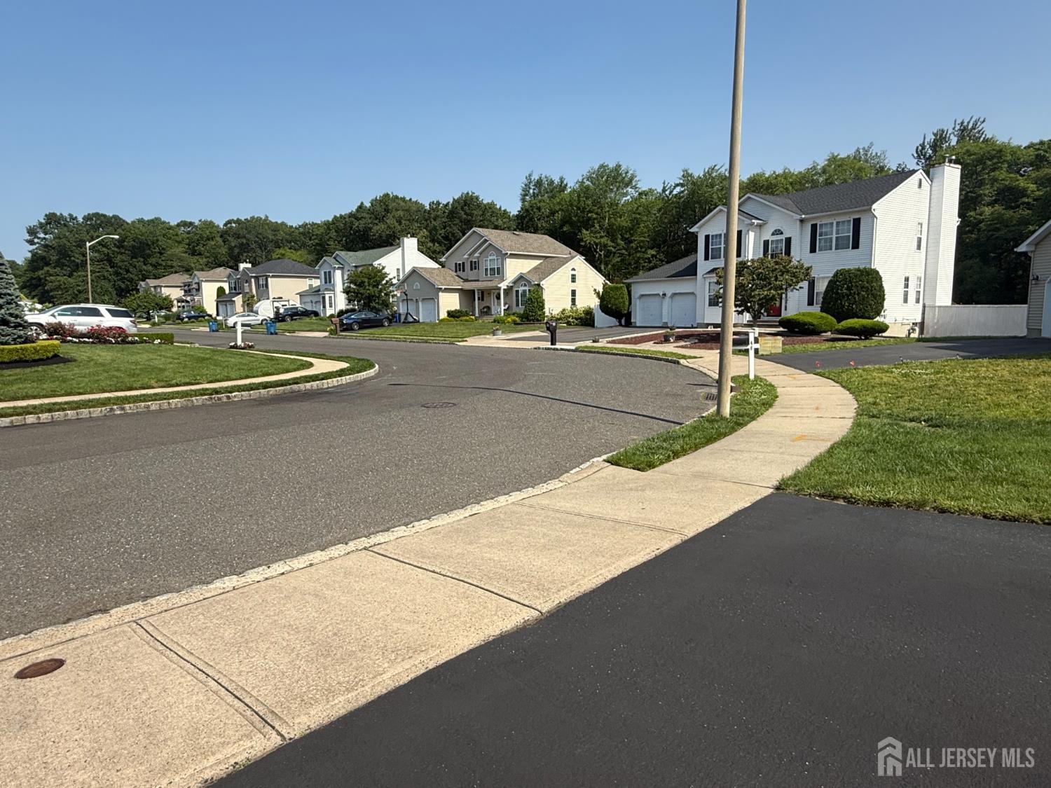 44 Diamond Lane Howell, NJ 07731 - Photo 35 of 35 a view of multiple houses with a yard