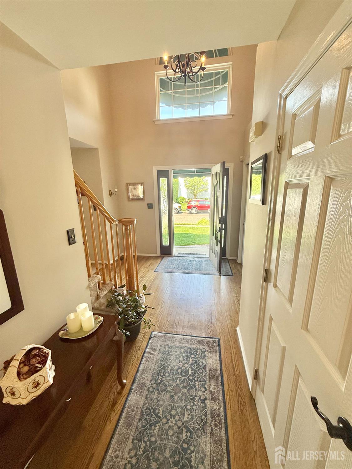 44 Diamond Lane Howell, NJ 07731 - Photo 4 of 35 a view of a entryway door of the house and living room