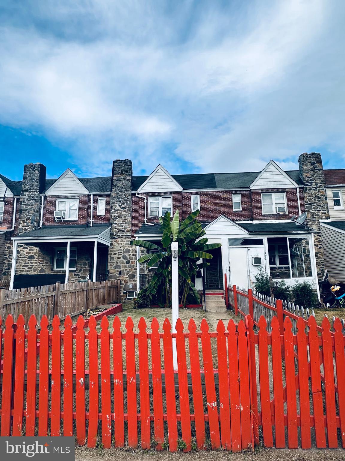 3804 Brooklyn Avenue Baltimore, MD 21225 - Photo 2 of 26 a front view of multiple houses