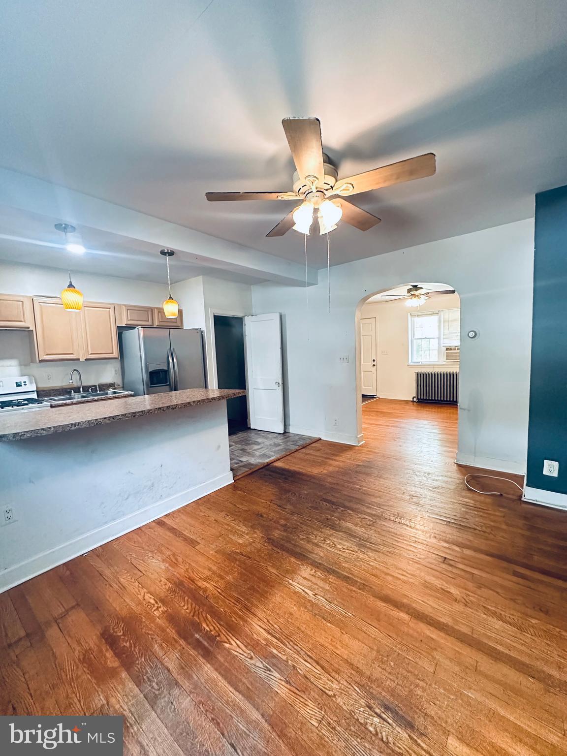 3804 Brooklyn Avenue Baltimore, MD 21225 - Photo 10 of 26 a view of an empty room and kitchen view