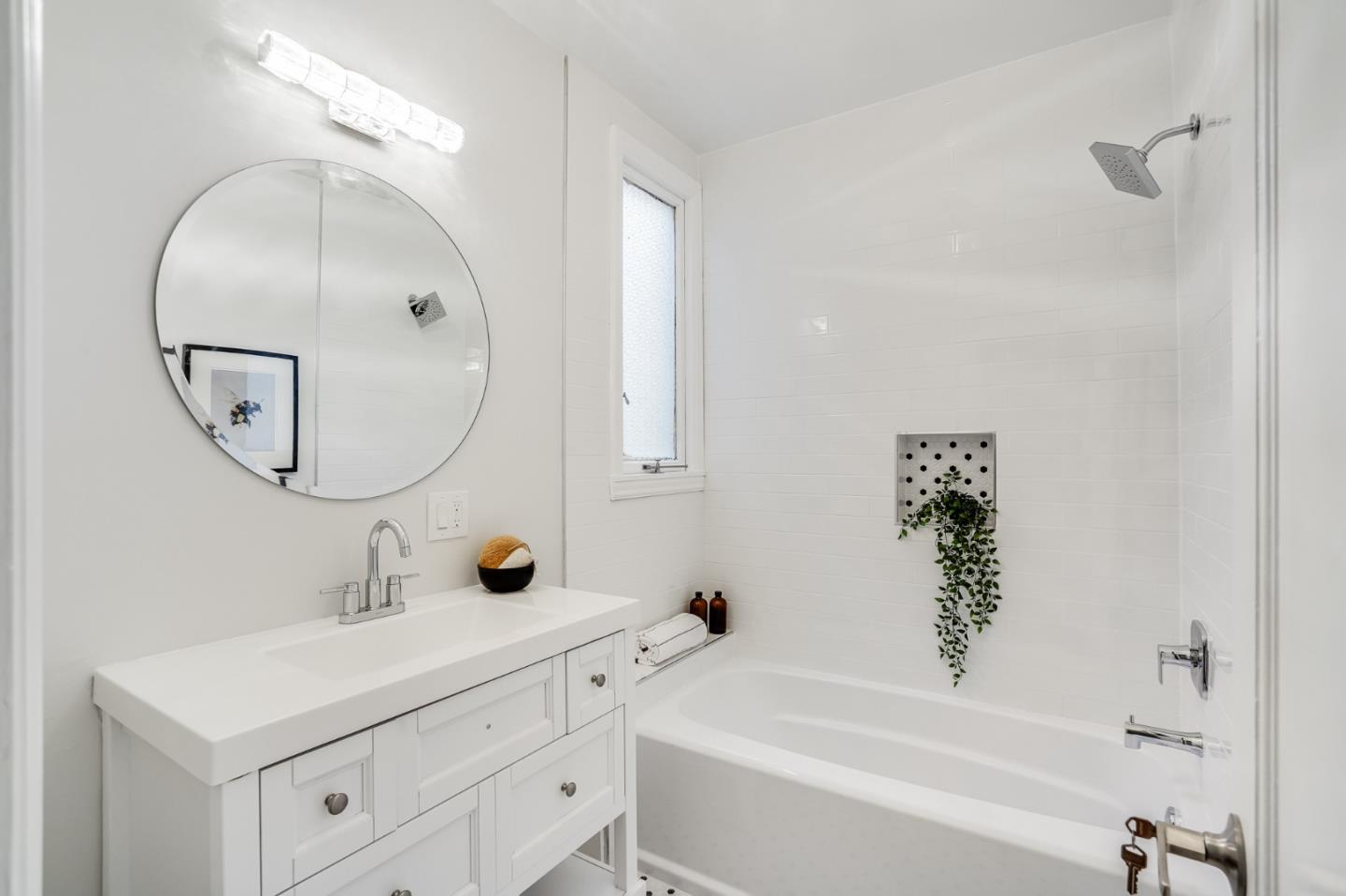 31-33 Boardman Place San Francisco, CA 94103 - Photo 19 of 35 a bathroom with a tub sink and mirror