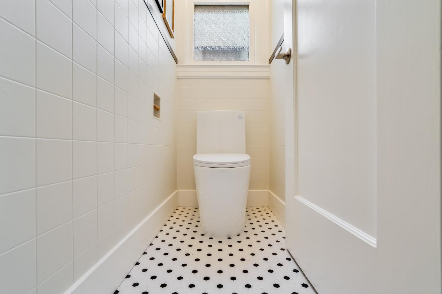 31-33 Boardman Place San Francisco, CA 94103 - Photo 21 of 35 a bathroom with a sink and a toilet