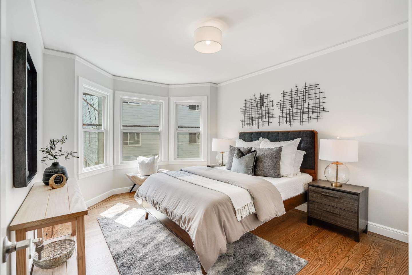 31-33 Boardman Place San Francisco, CA 94103 - Photo 24 of 35 a bedroom with bed and a large window