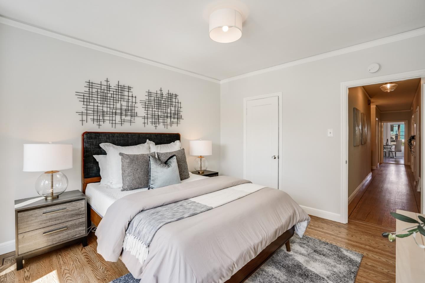 31-33 Boardman Place San Francisco, CA 94103 - Photo 25 of 35 a bed room with a bed and a night stand