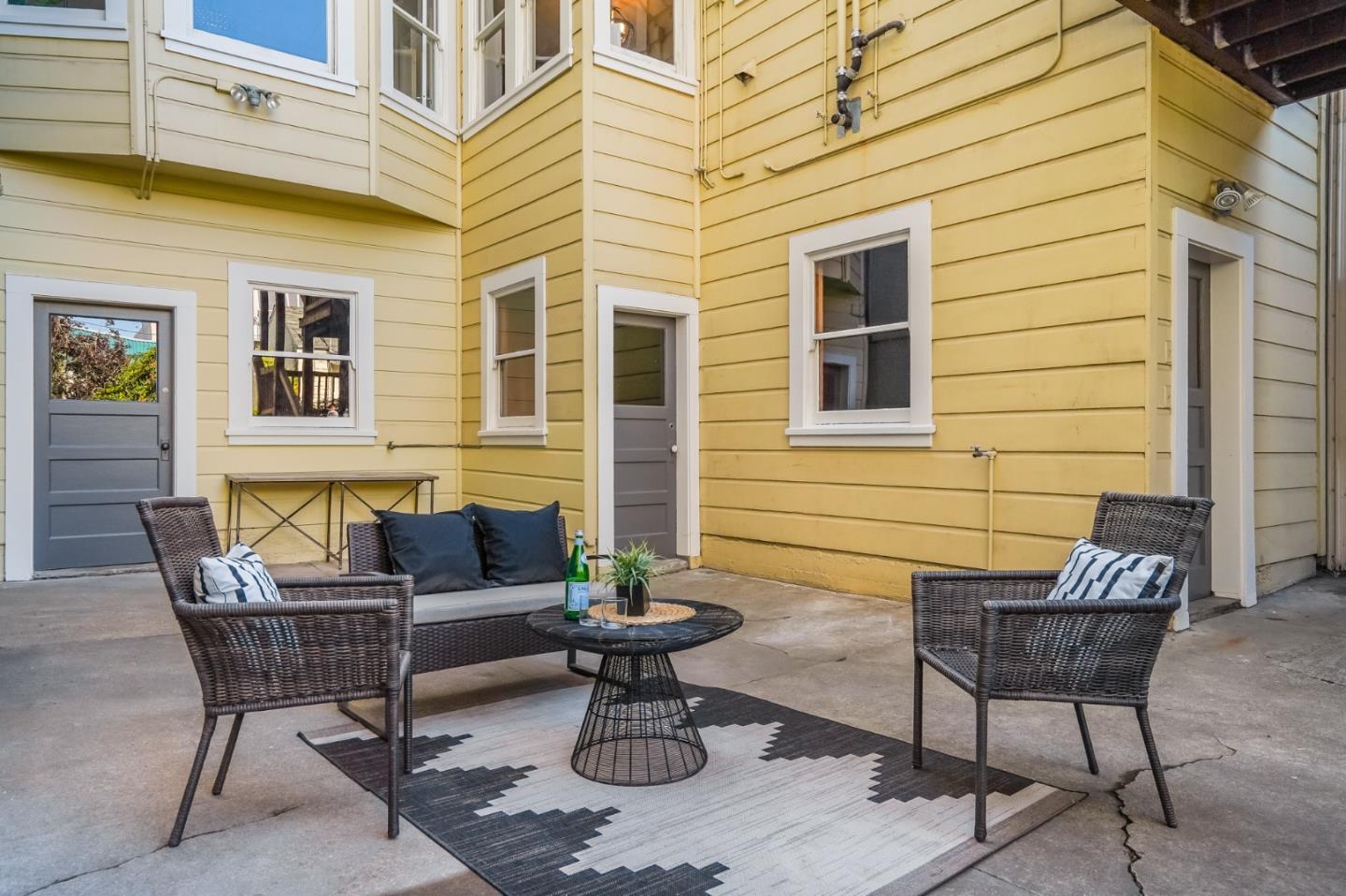 31-33 Boardman Place San Francisco, CA 94103 - Photo 32 of 35 a view of a patio with couple of chairs