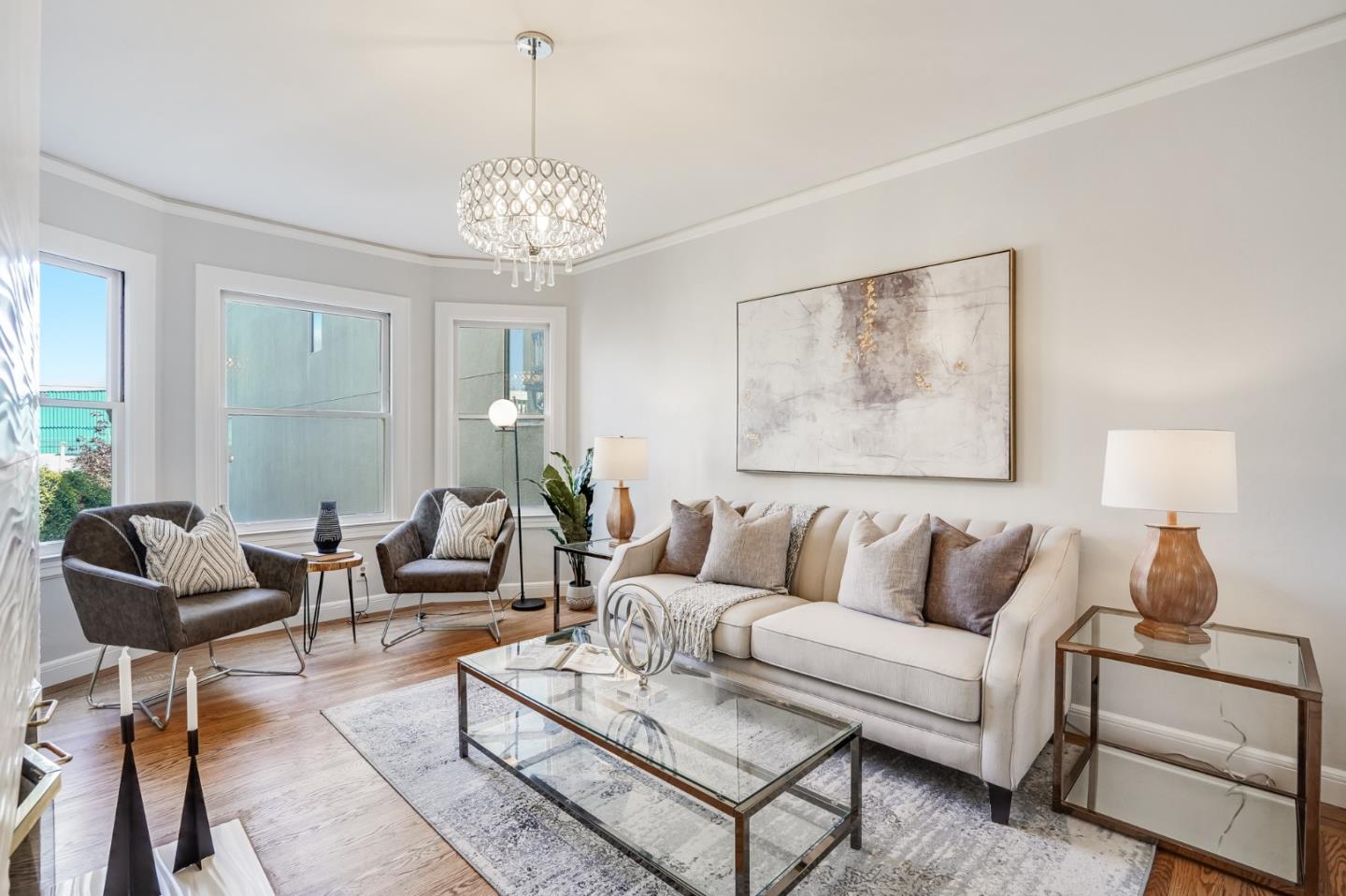 31-33 Boardman Place San Francisco, CA 94103 - Photo 10 of 35 a living room with furniture and a chandelier