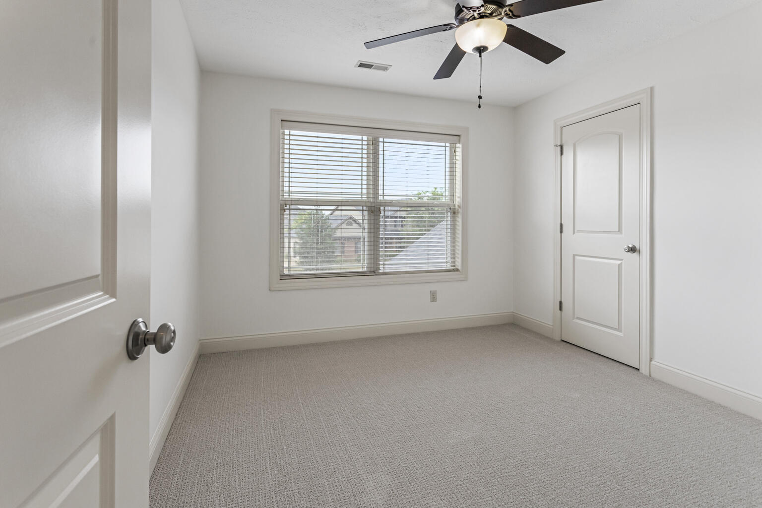 5102 Jacks Boulevard Champaign, IL 61822 - Photo 23 of 40 a view of an empty room with a window