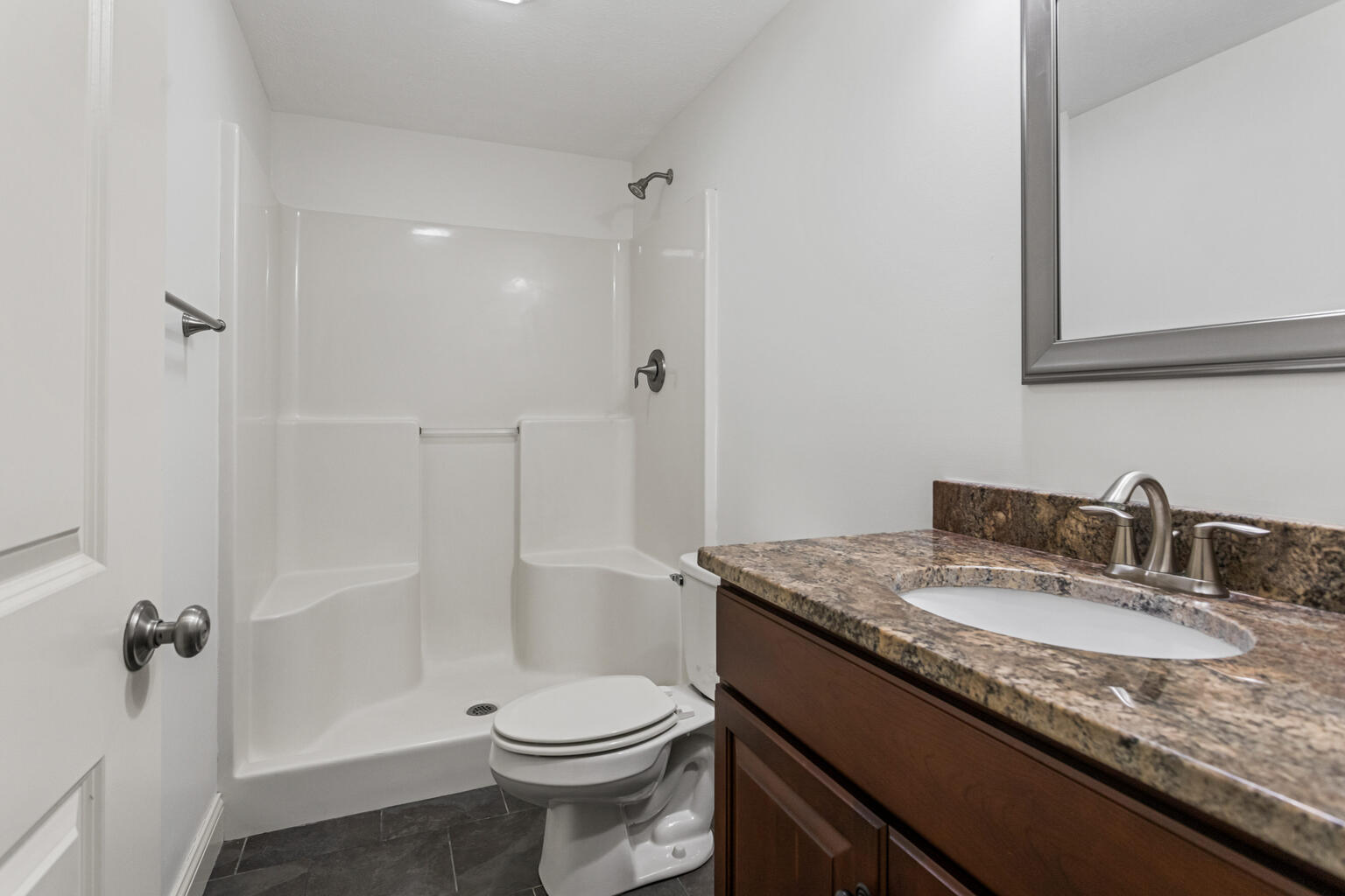 5102 Jacks Boulevard Champaign, IL 61822 - Photo 35 of 40 a bathroom with a granite countertop sink toilet and shower