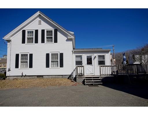 19 Bridge Road Salisbury, MA 01952 - Photo 3 of 9 a front view of a house with a yard