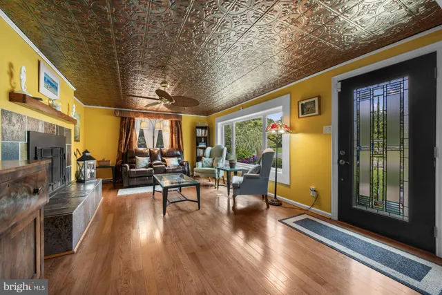 a view of a patio with table and chairs
