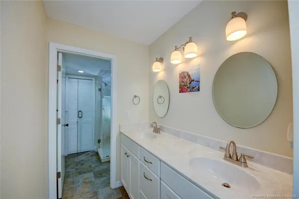 a bathroom with a shower and toilet