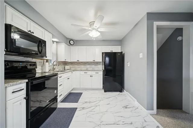 a bedroom with a bed and furniture