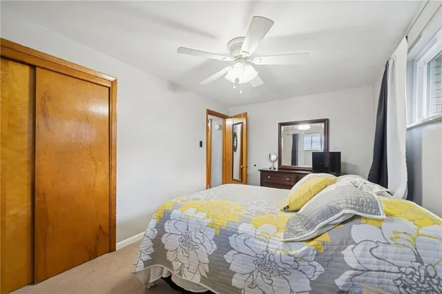 a view of a house with wooden deck