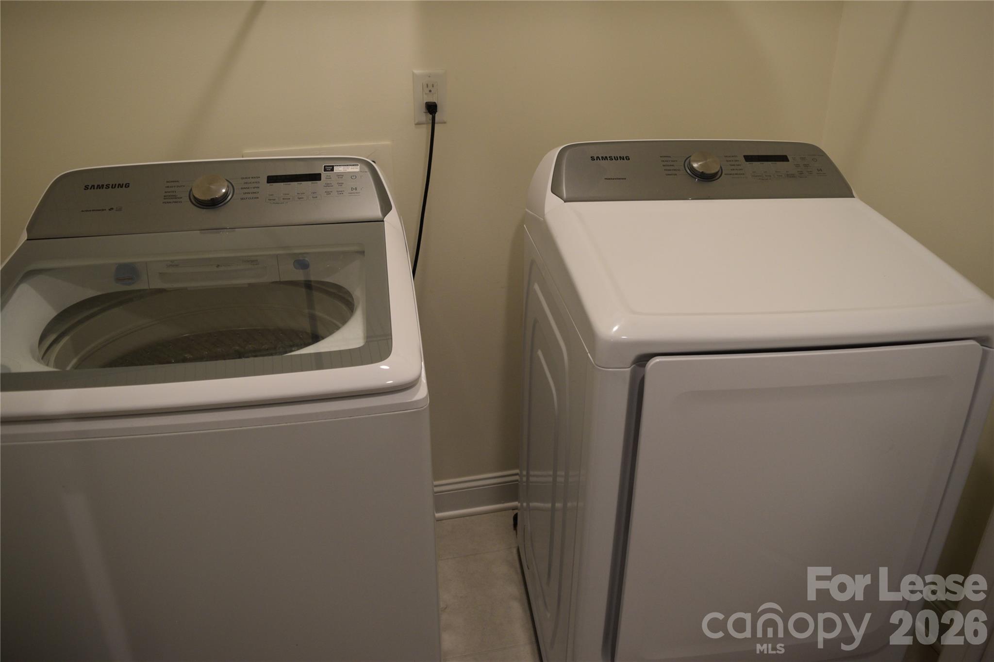 4011 Rothwood Lane Harrisburg, NC 28075 - Photo 22 of 29 a utility room with dryer and washer