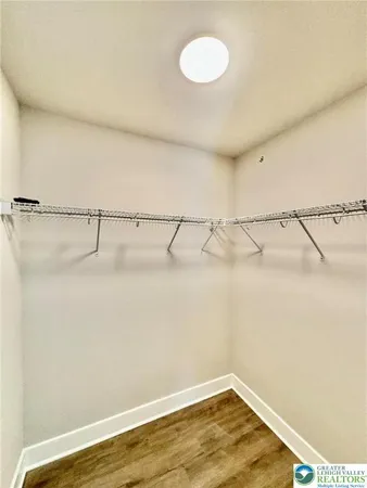 a view of a room with racks on the wall