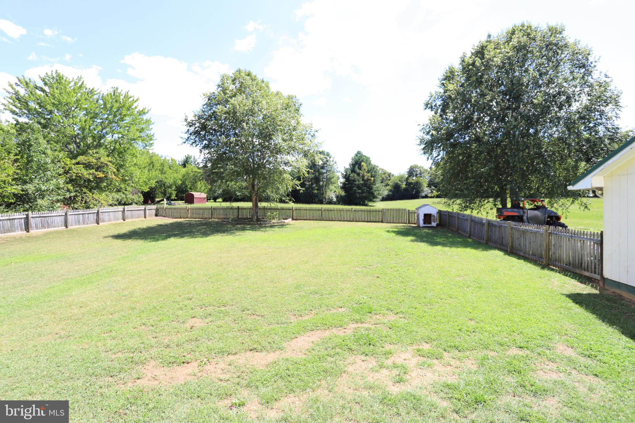 23202 Village Road Unionville, VA 22567 - Photo 28 of 28 a view of an outdoor space and swimming pool