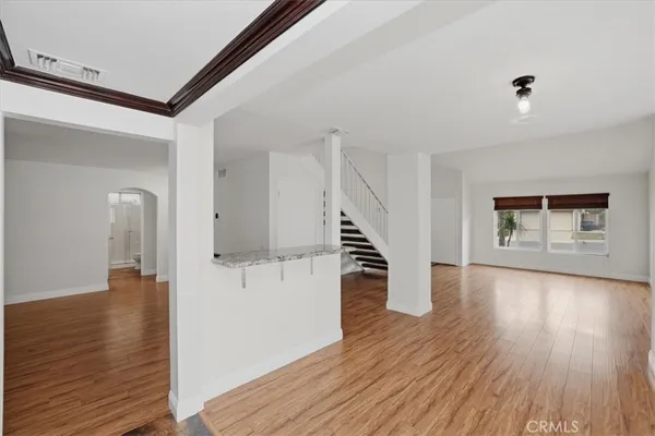 a view of small space with wooden floor