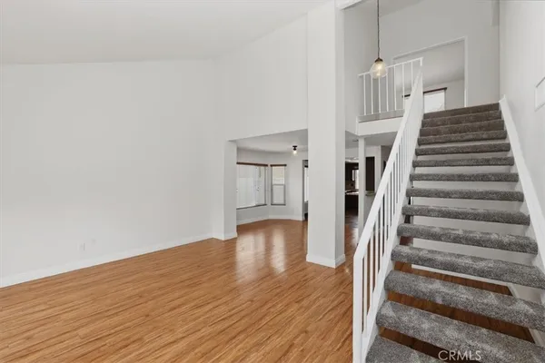 a bedroom with furniture and a couch