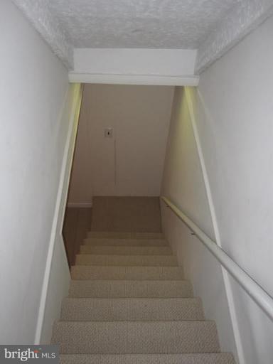 12709 Holdridge Road Silver Spring, MD 20906 - Photo 17 of 22 Basement stairs