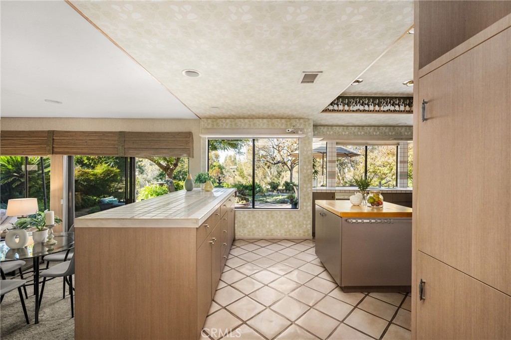 2927 Treeview Place Fullerton, CA 92835 - Photo 21 of 62 a room with sink a large window and a table