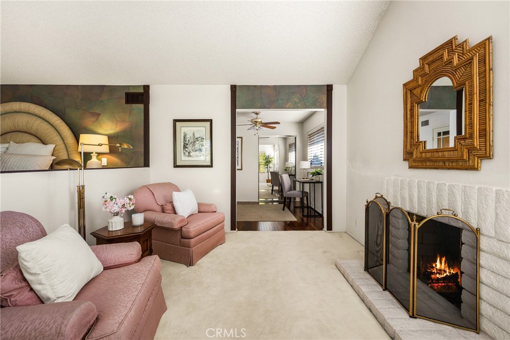 2927 Treeview Place Fullerton, CA 92835 - Photo 45 of 62 a living room with furniture and a fireplace