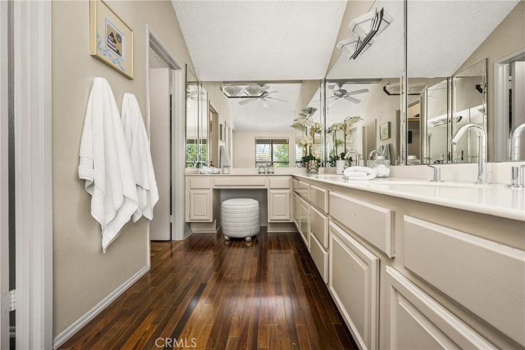 2927 Treeview Place Fullerton, CA 92835 - Photo 48 of 62 a kitchen with a sink and wooden floor