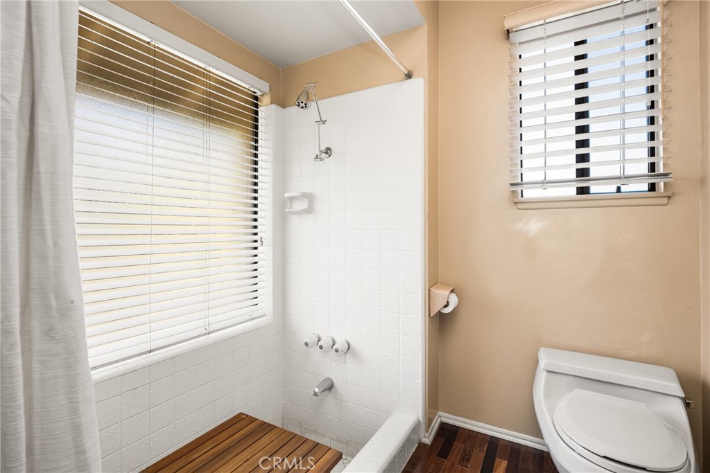2927 Treeview Place Fullerton, CA 92835 - Photo 50 of 62 a bathroom with a toilet and a window