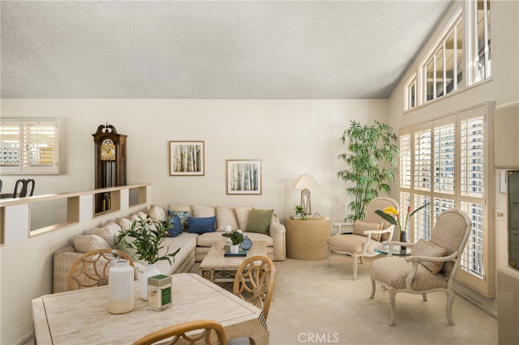 2927 Treeview Place Fullerton, CA 92835 - Photo 9 of 62 a living room with furniture and floor to ceiling windows