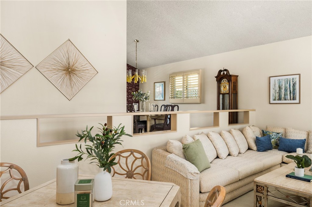 2927 Treeview Place Fullerton, CA 92835 - Photo 10 of 62 a living room with furniture kitchen view and a potted plant