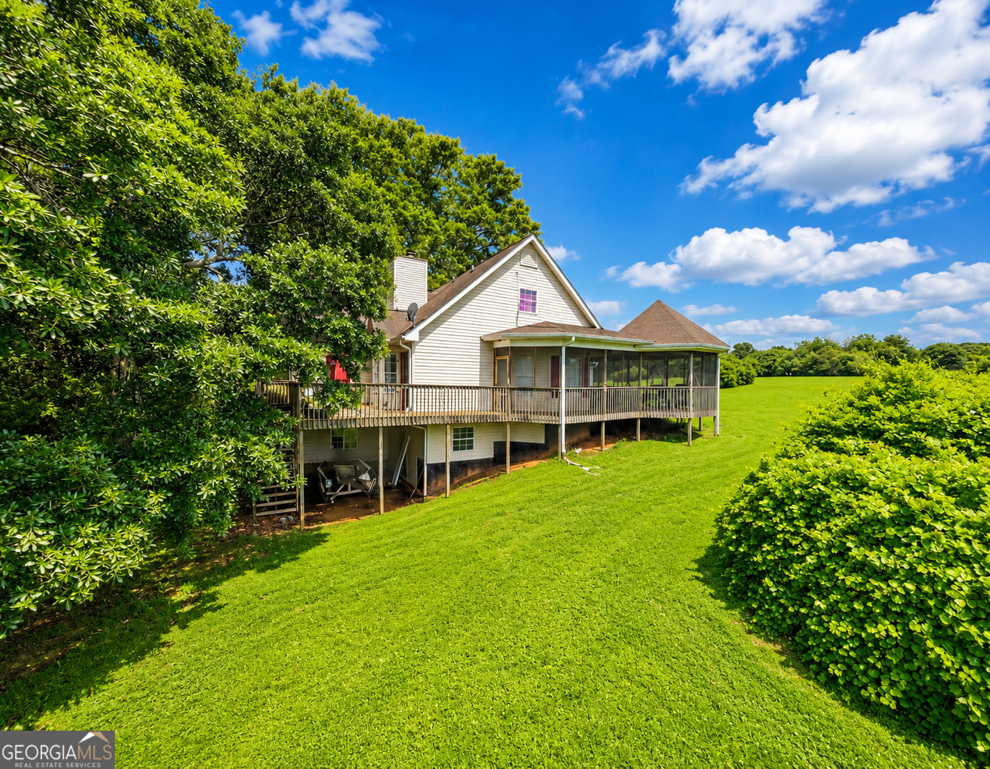 2433 Bear Creek Road Statham, GA 30666 - Photo 10 of 58 a front view of house with a garden