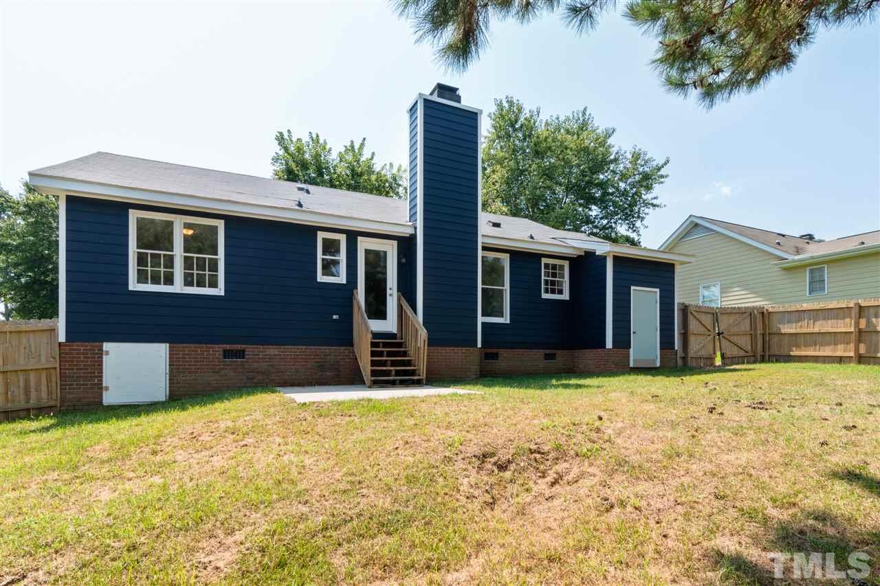 3324 Castlegate Drive Raleigh, NC 27616 - Photo 22 of 26 a house that has a tree in front of it