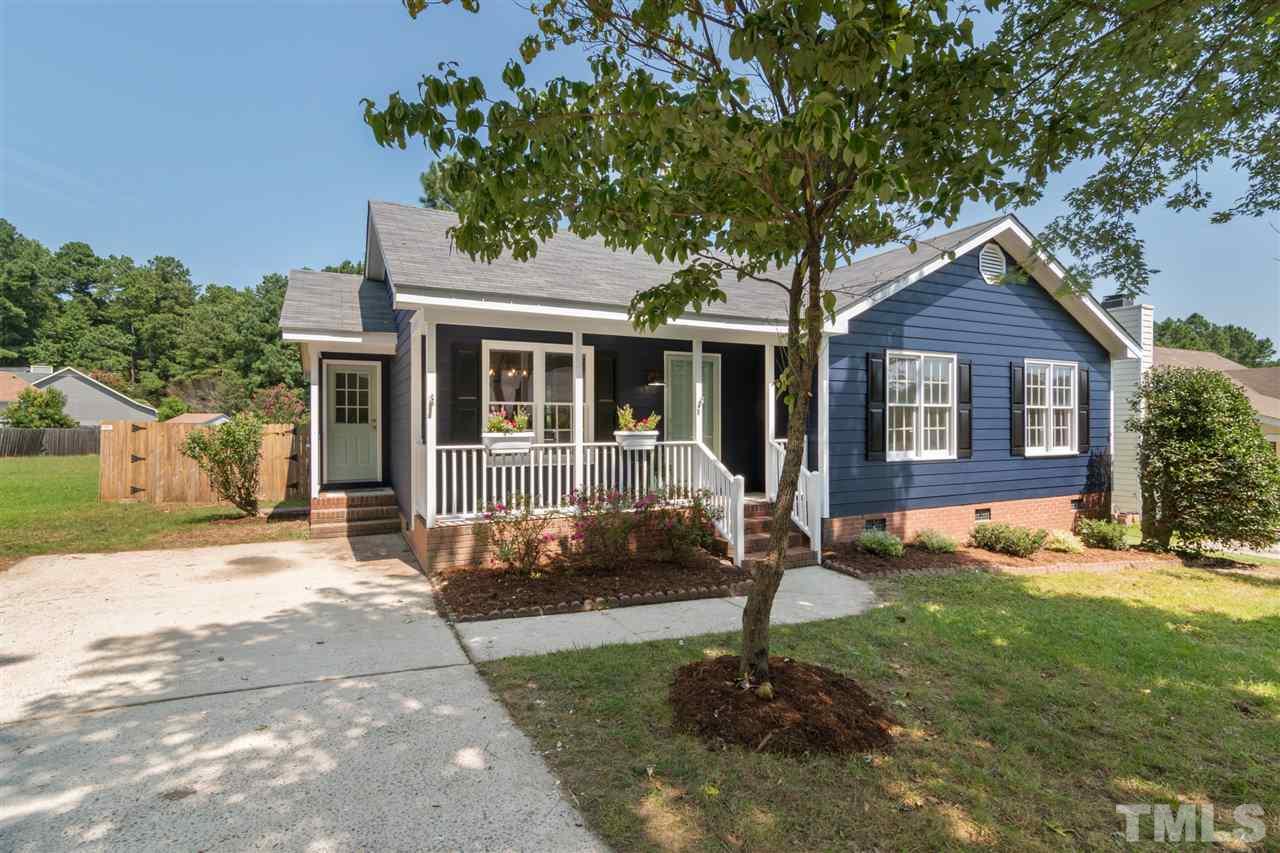 3324 Castlegate Drive Raleigh, NC 27616 - Photo 23 of 26 a front view of a house with yard