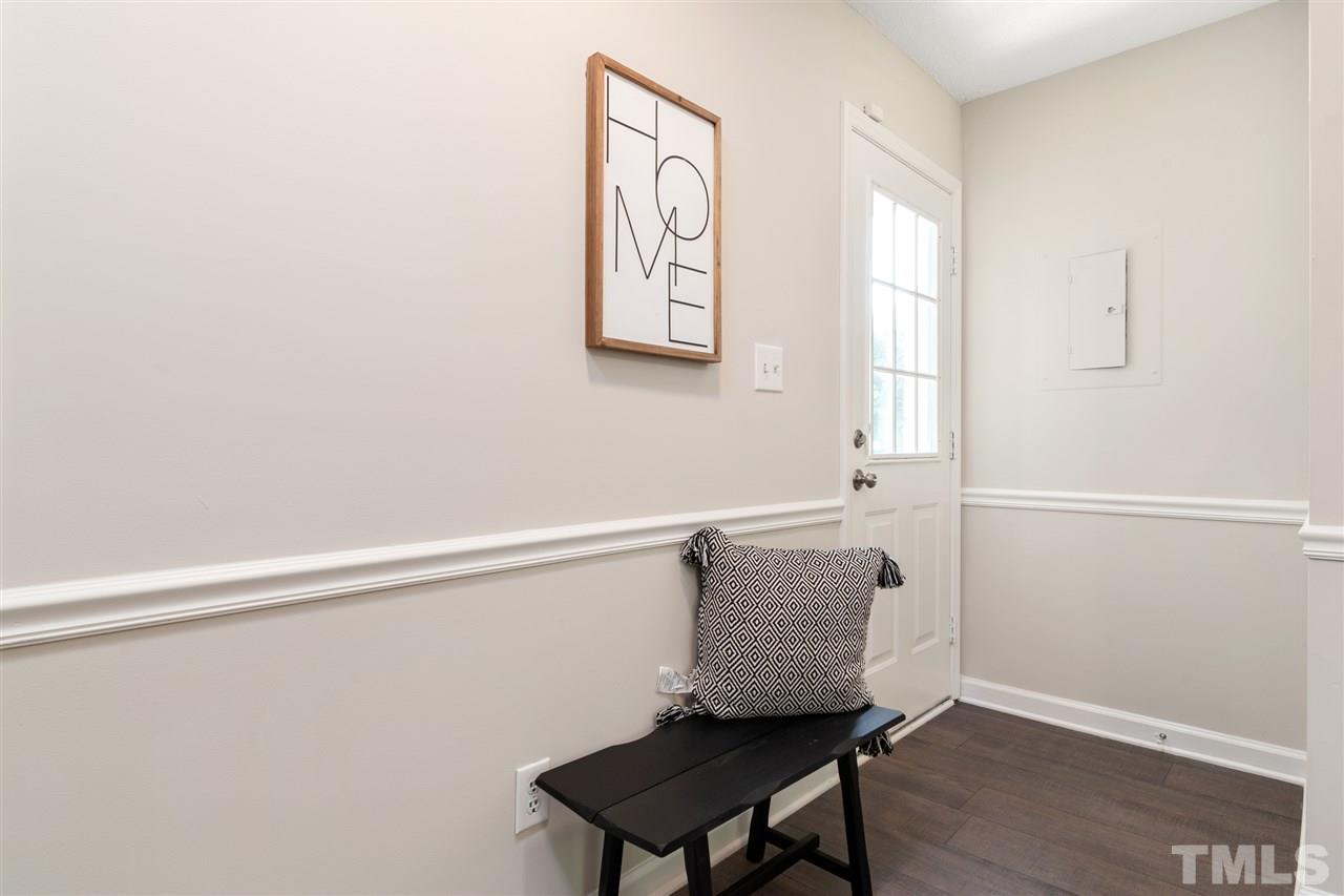 3324 Castlegate Drive Raleigh, NC 27616 - Photo 10 of 26 a room with a table and a chair