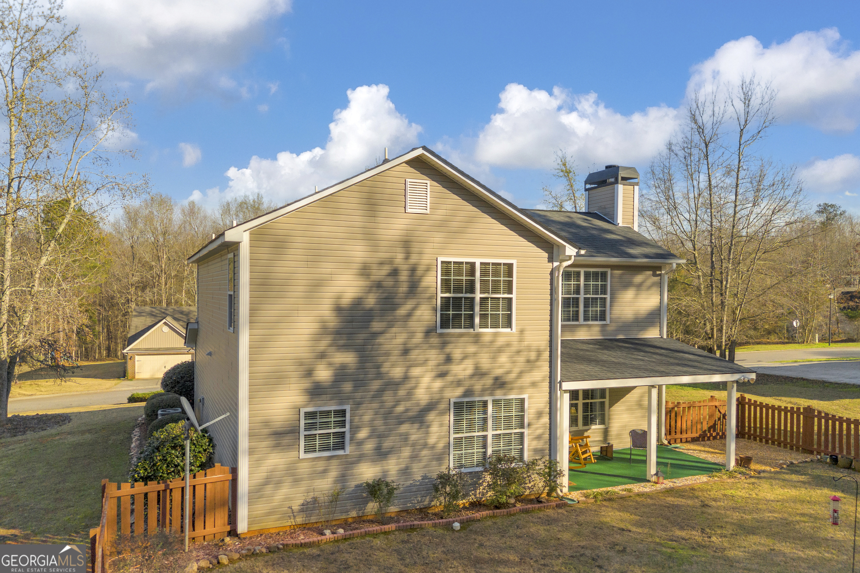 259 Watson Drive Hull, GA 30646 - Photo 12 of 47 a view of a house with a backyard