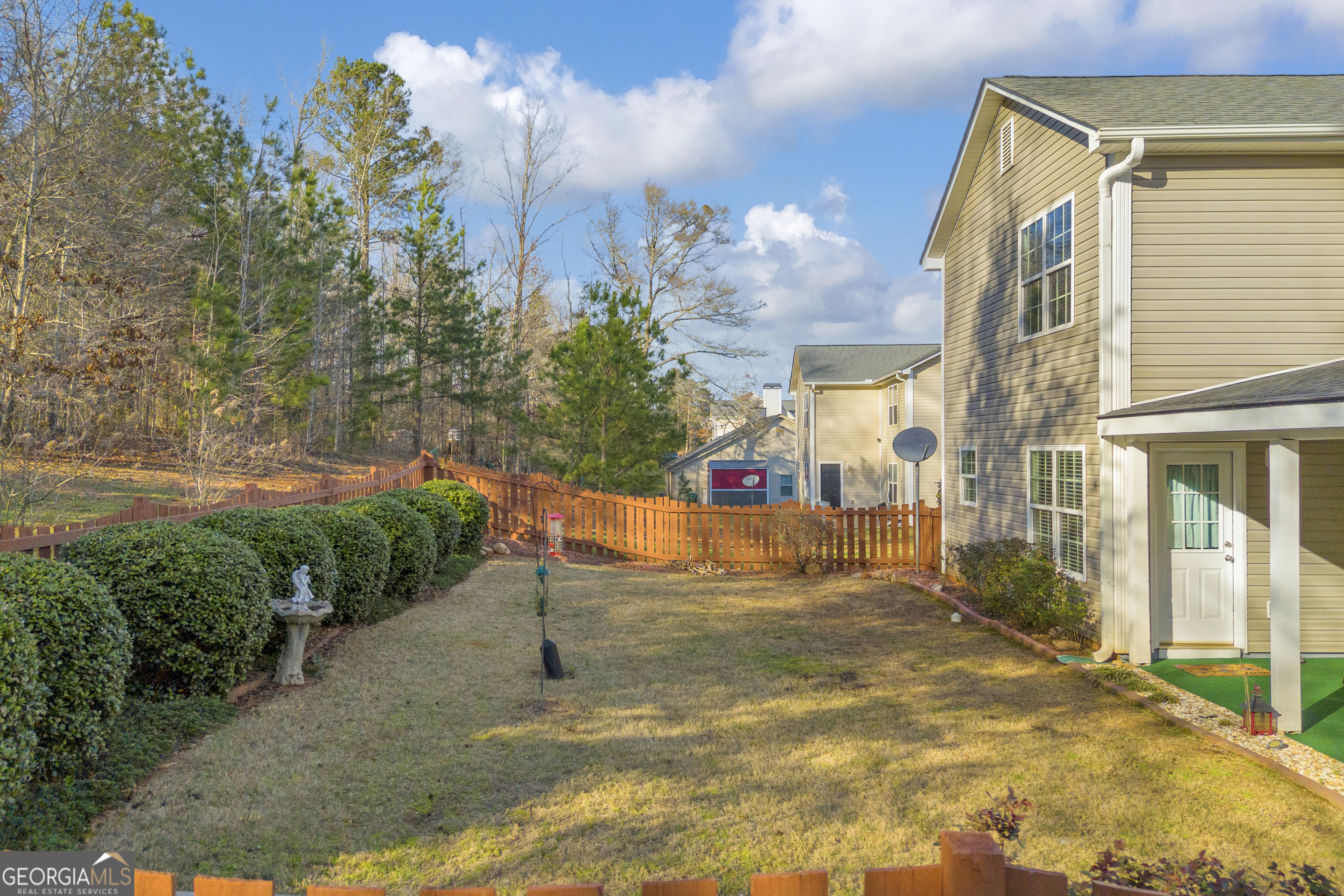 259 Watson Drive Hull, GA 30646 - Photo 13 of 47 a view of a street with houses on both side