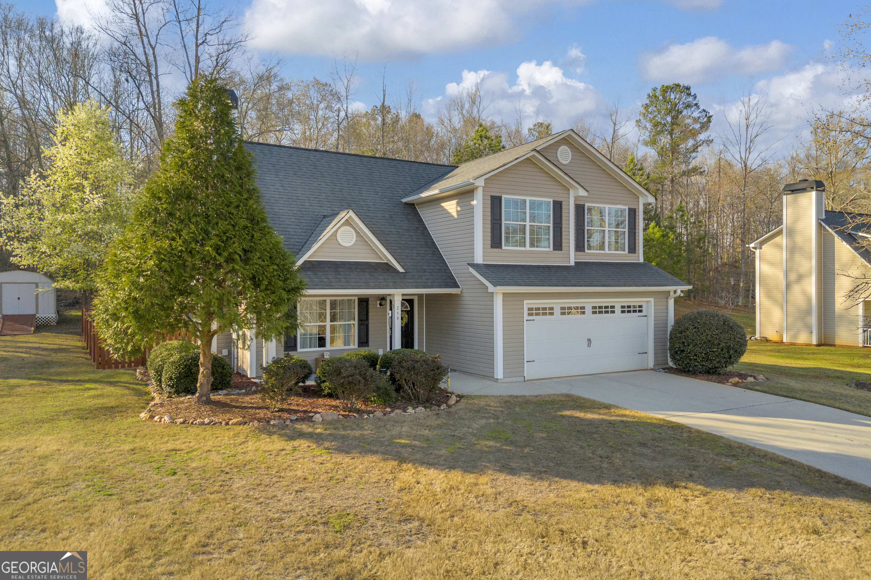 259 Watson Drive Hull, GA 30646 - Photo 2 of 47 a front view of a house with a yard