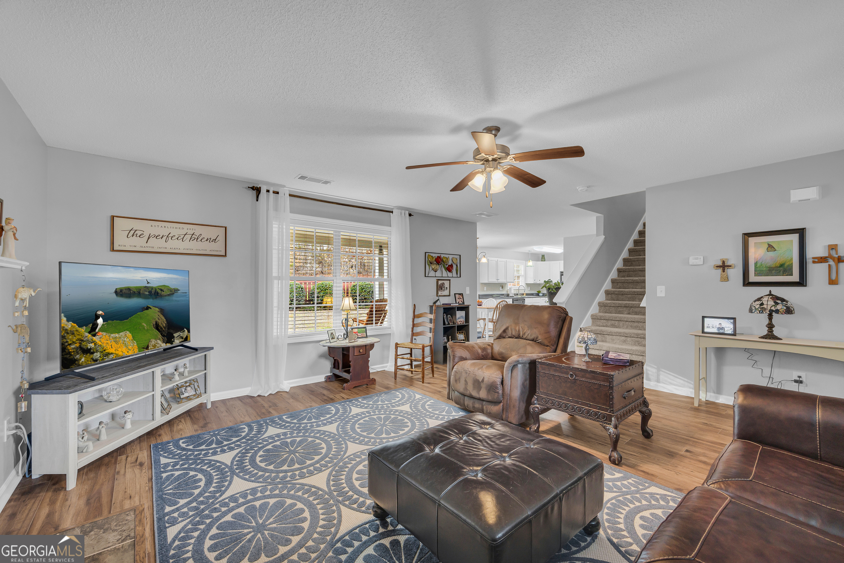 259 Watson Drive Hull, GA 30646 - Photo 24 of 47 a living room with furniture and a flat screen tv
