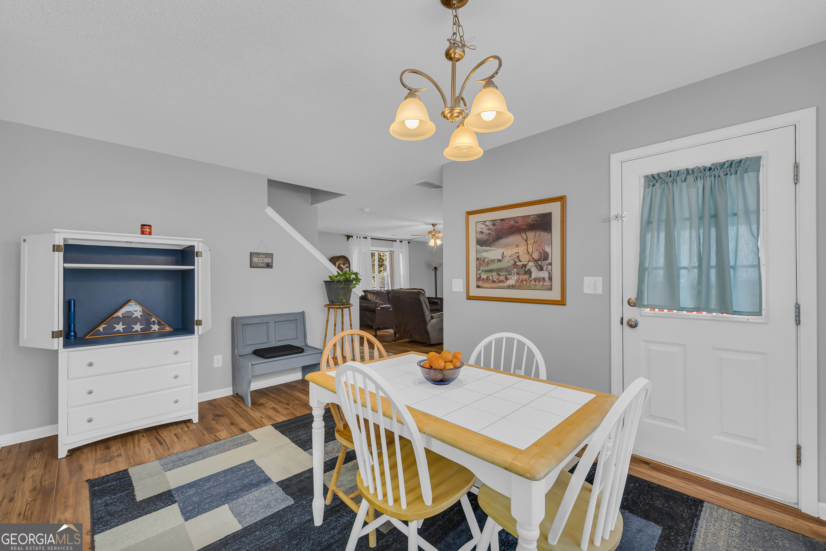 259 Watson Drive Hull, GA 30646 - Photo 26 of 47 a view of a dining room with furniture and chandelier